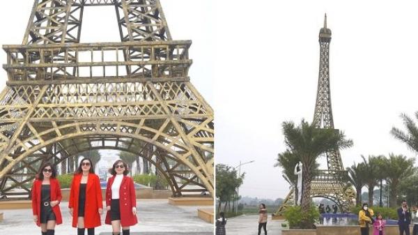 Tháp Eiffel “phiên bản Thanh Hóa” có chiều cao gần 30m và được lắp ráp từ rất nhiều tấm thép đã thu hút không ít người dân mọi lứa tuổi đến check-in, chụp hình lưu niệm. (Nguồn ảnh: bongda.tintuc.vn)
